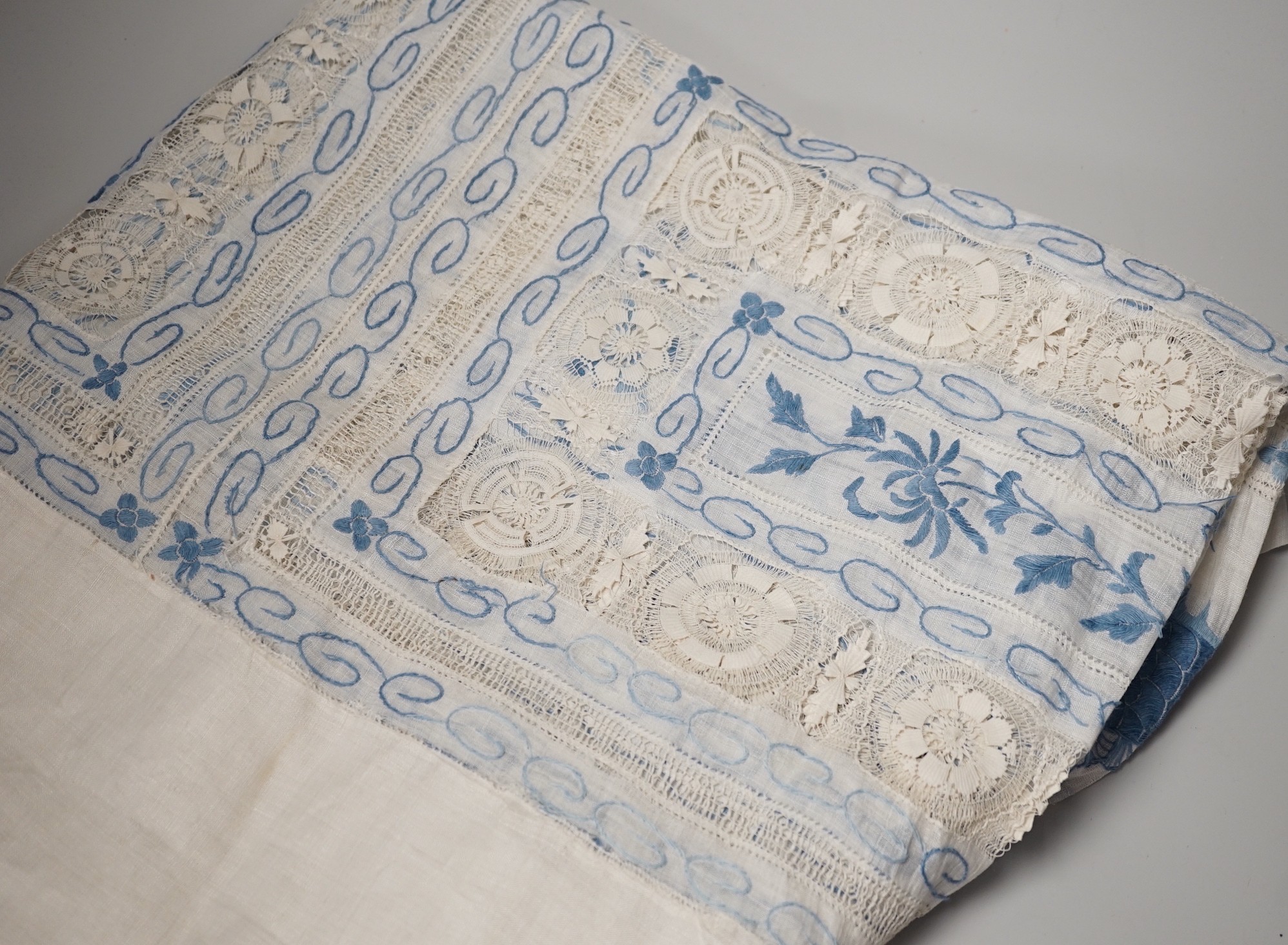 An early 20th century Chinese embroidered linen 'dragon' table cloth